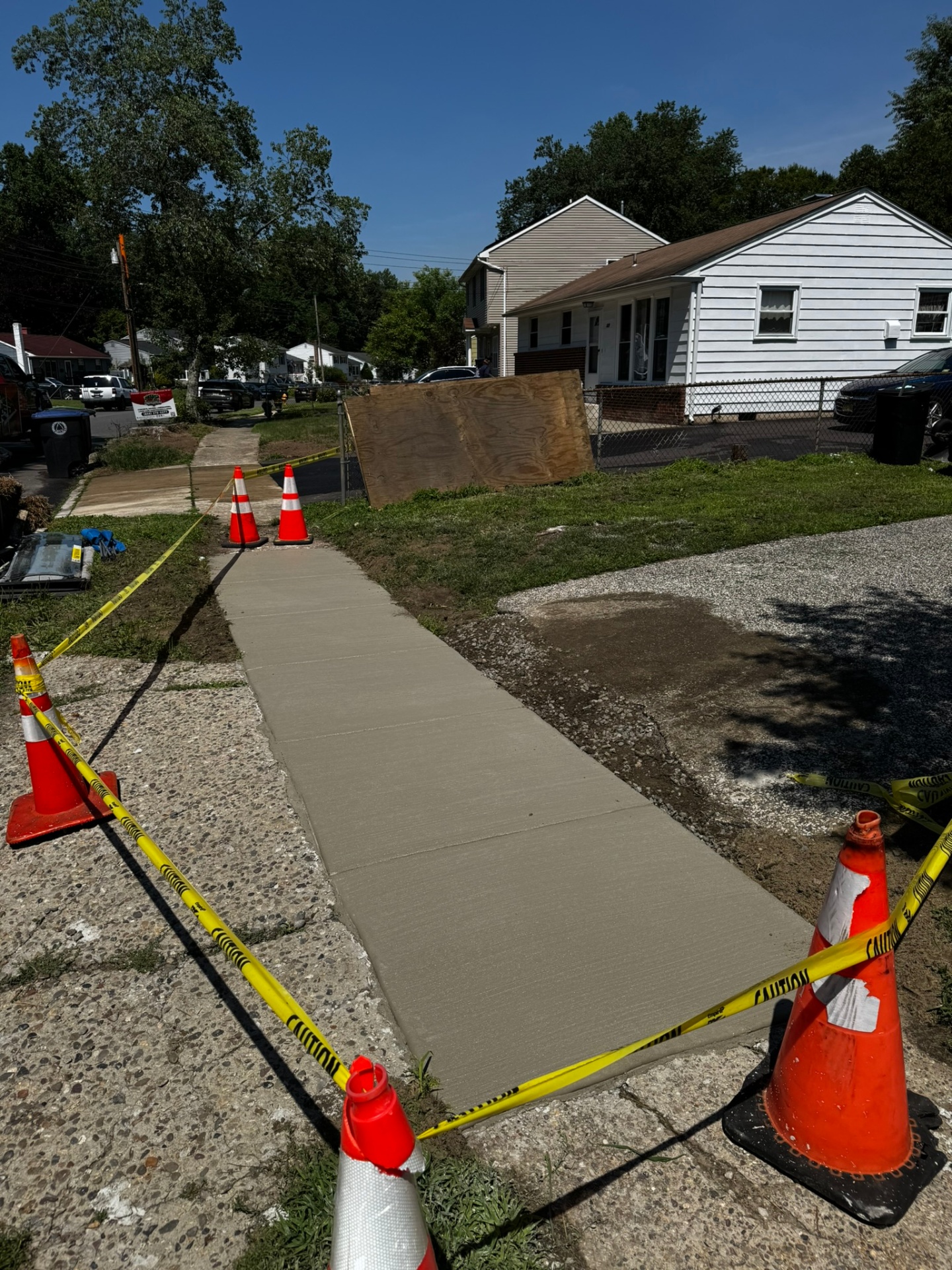 Concrete sidewalk replacement — Lindenwold, NJ New concrete sidewalk replacement at a front entry in Lindenwold, NJ
